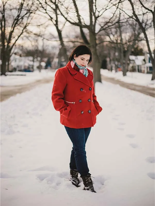 Christine-weary-snow Christine Trimpe in the snow with red coat